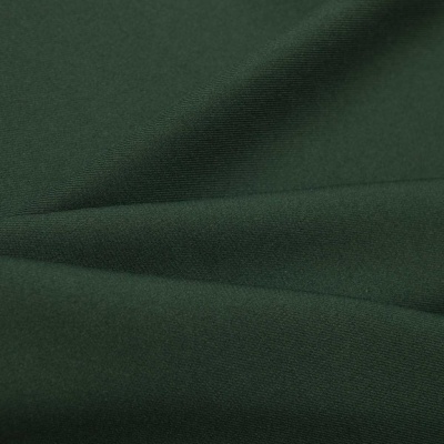 Ткань костюмная 21010 2076, 225 гр/м2, шир.150см, цвет т.зеленый - купить в Первоуральске. Цена 390.73 руб.